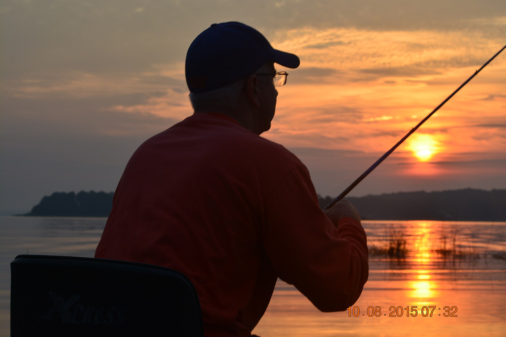 Early morning bass strike — the moment your sonar settings prove themselves.